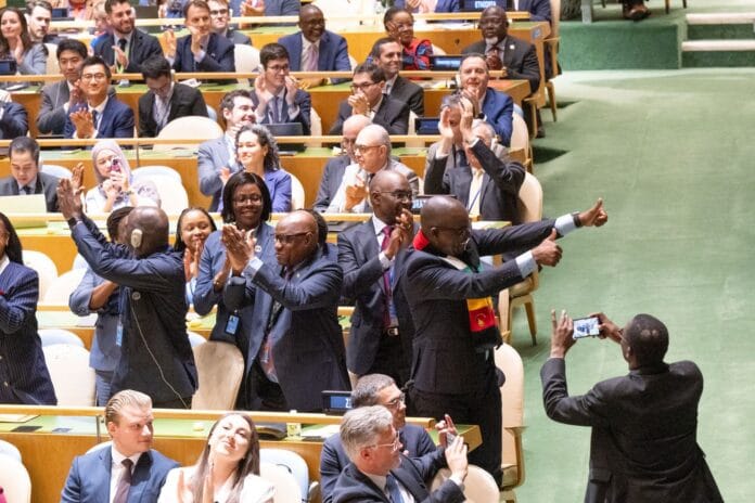 UN Photo/Eskinder Debebe The delegation of Zimbabwe celebrate after being elected.