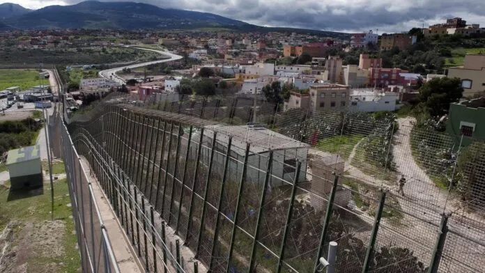 Fortified border fence separating Morocco from the Spanish enclave of Melilla